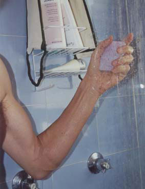 a picture of someone in the shower accidently hitting their funny bone